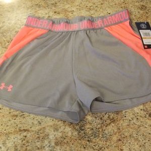 Women play up performance shorts